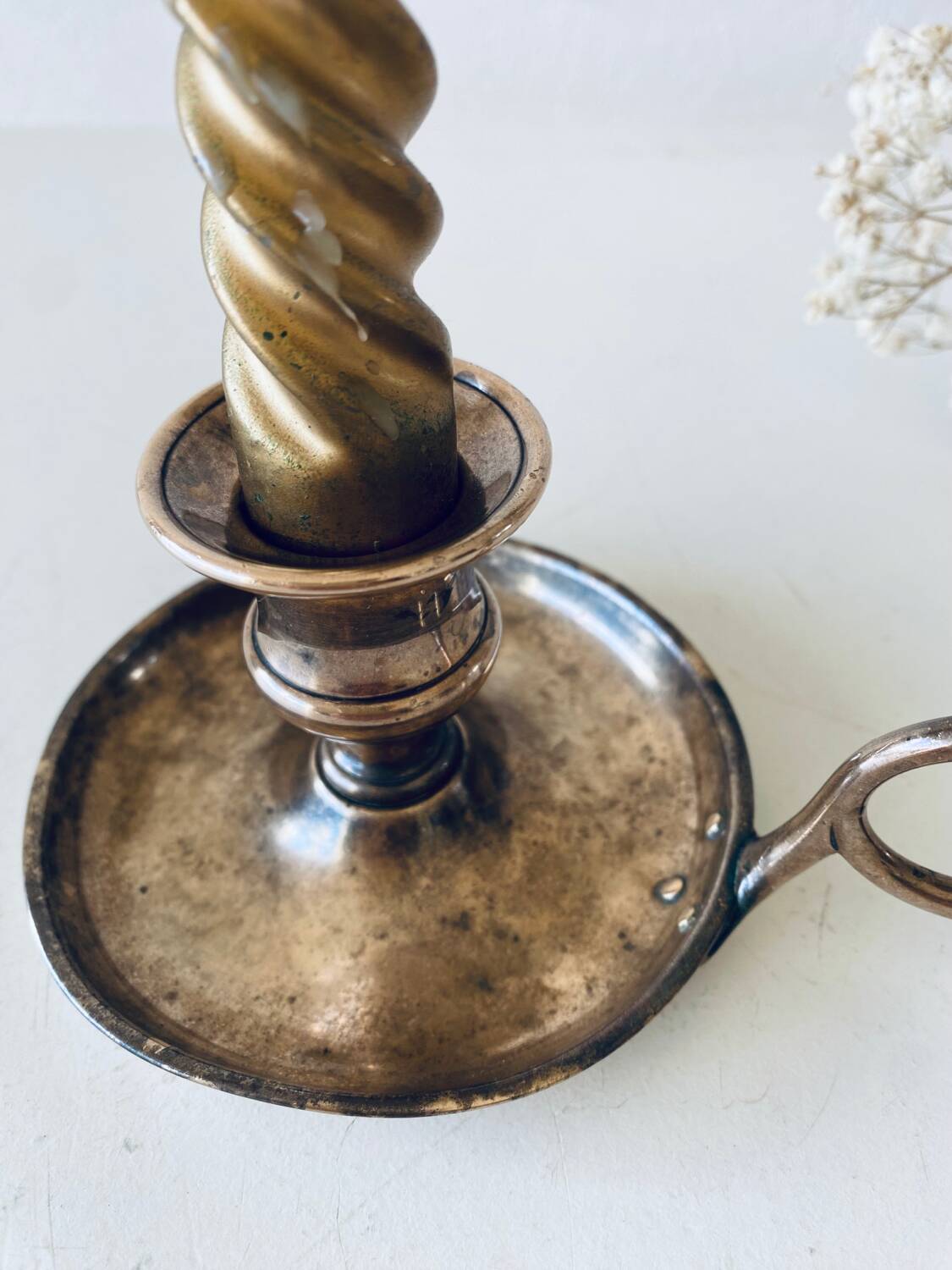 Brass thumbscrew candle holder