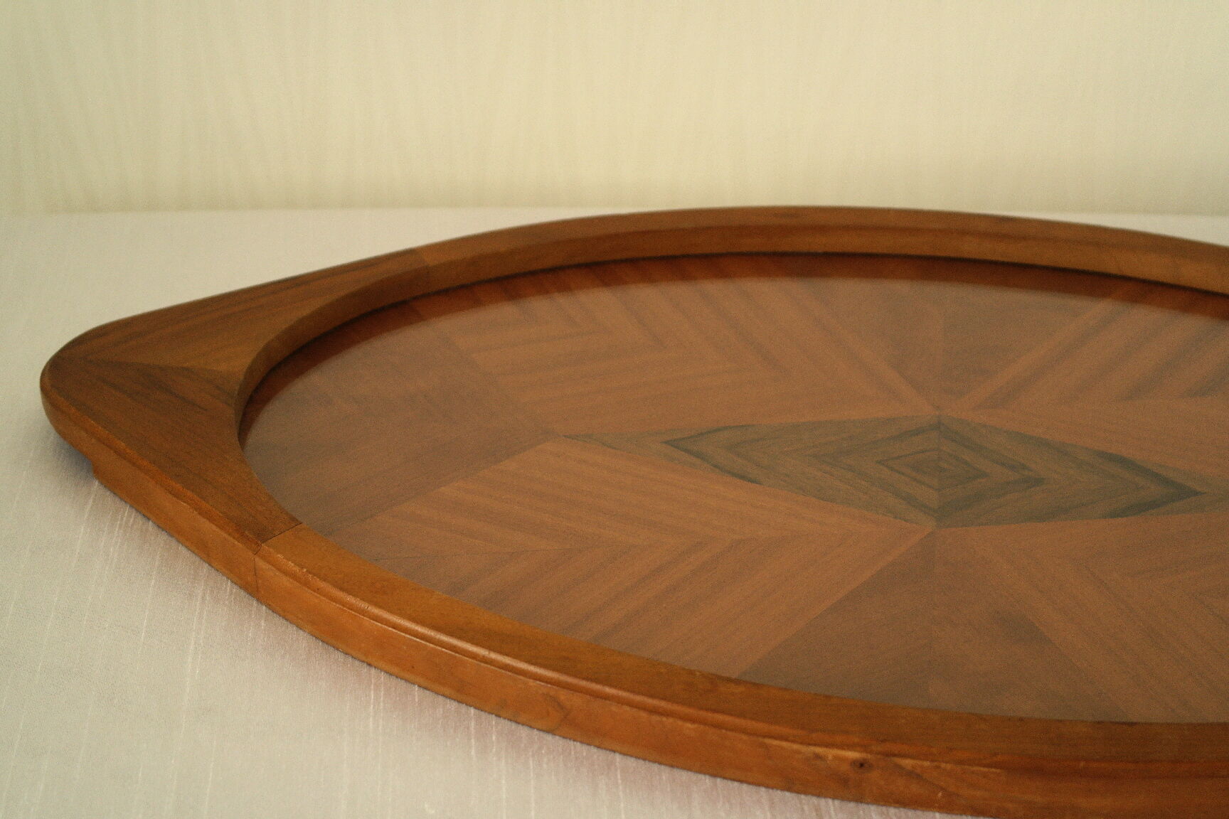 Oval wooden tray with glass and artisanal marquetry from the 70s.