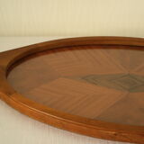 Oval wooden tray with glass and artisanal marquetry from the 70s.