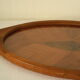 Oval wooden tray with glass and artisanal marquetry from the 70s.