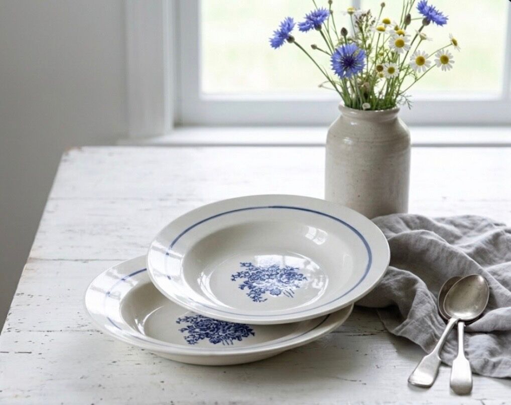 Pair of old hollow plates in earthenware