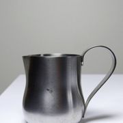 Set of 4 vintage bar measures in brushed stainless steel from the 60s-70s.