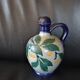 Stoneware olive oil pitcher