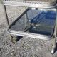 Rolling service silver metal and bluish glass