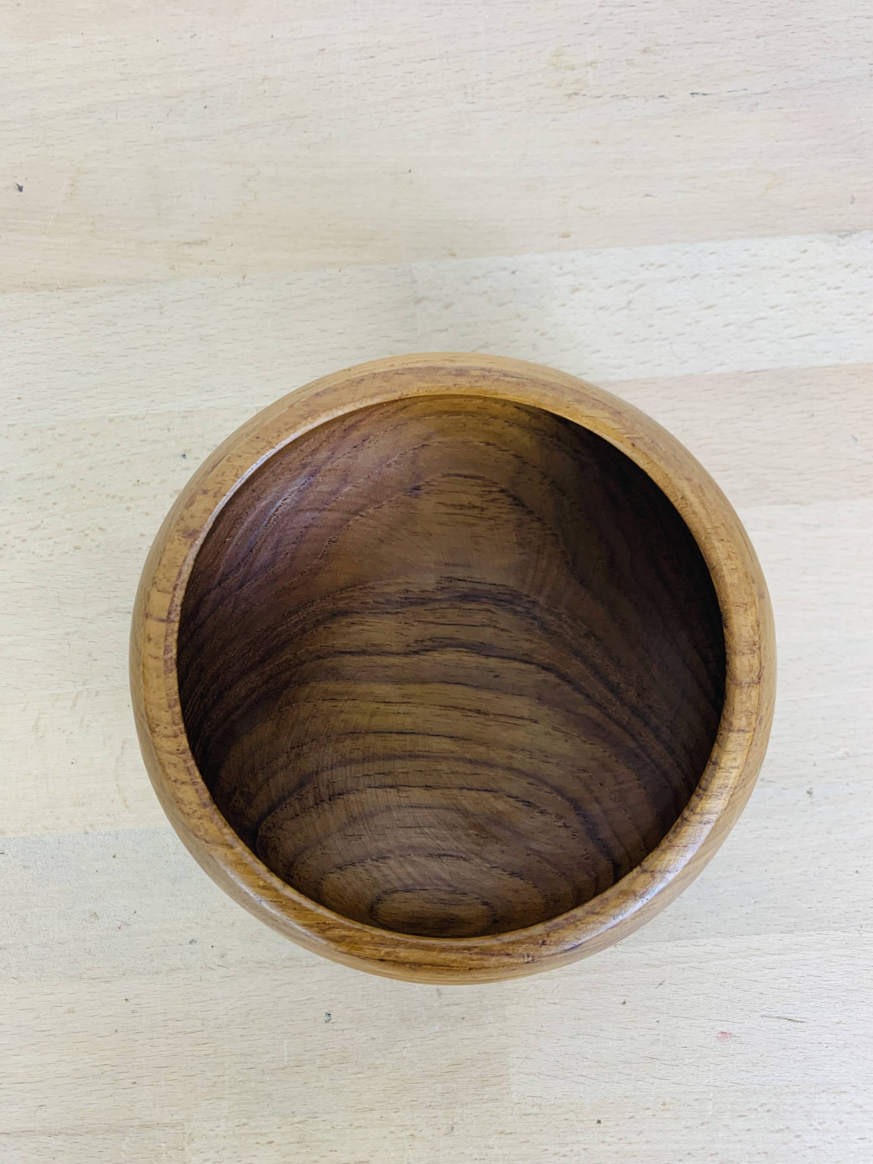 Scandinavian teak pocket emptier from the 60s