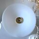 Suspension in opaline