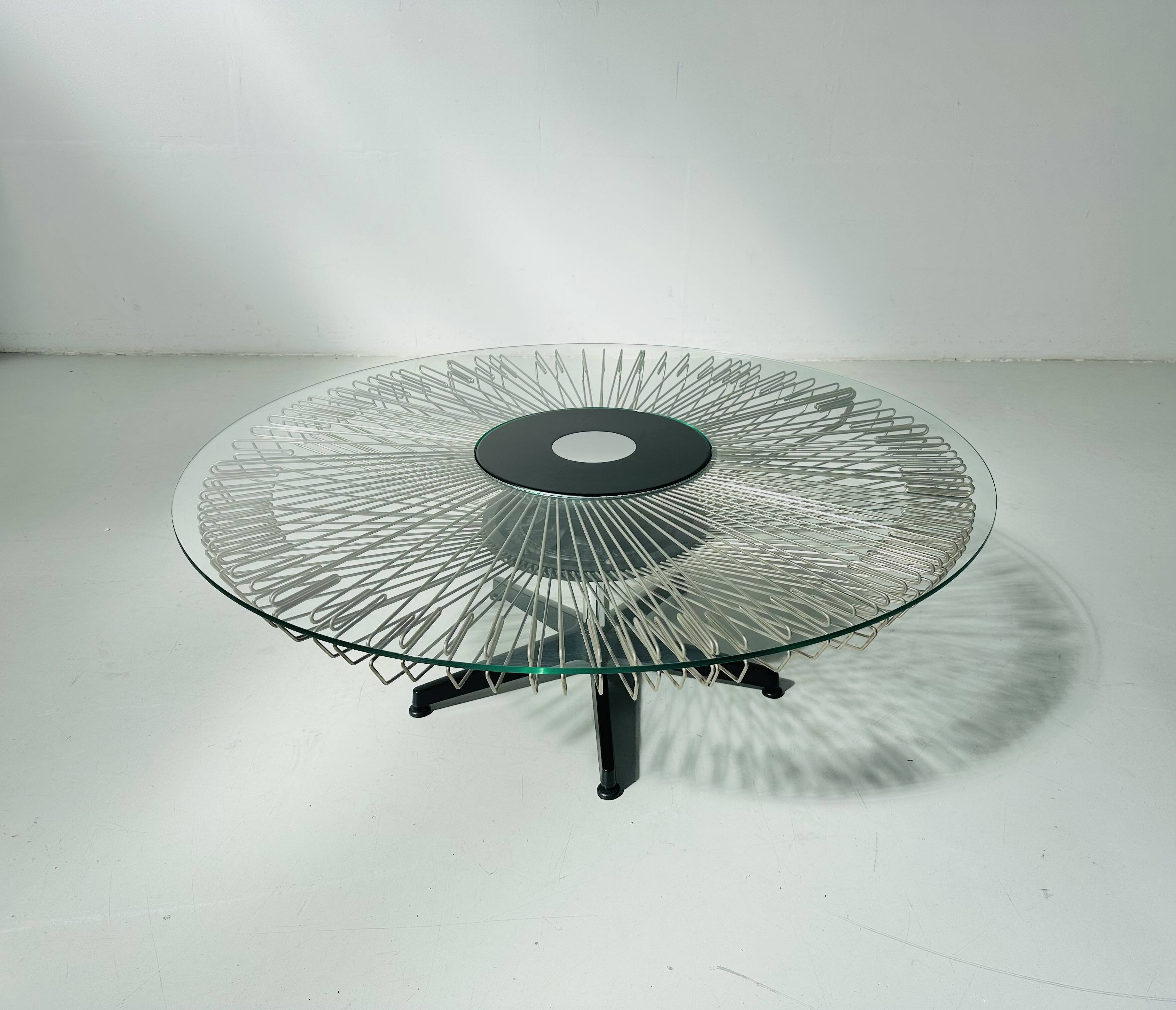 Italian rotating glass and metal coffee table designed for Prada, 1990s.
