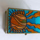 Blue and orange vintage jewellery box in 70s bohemian chic stained glass