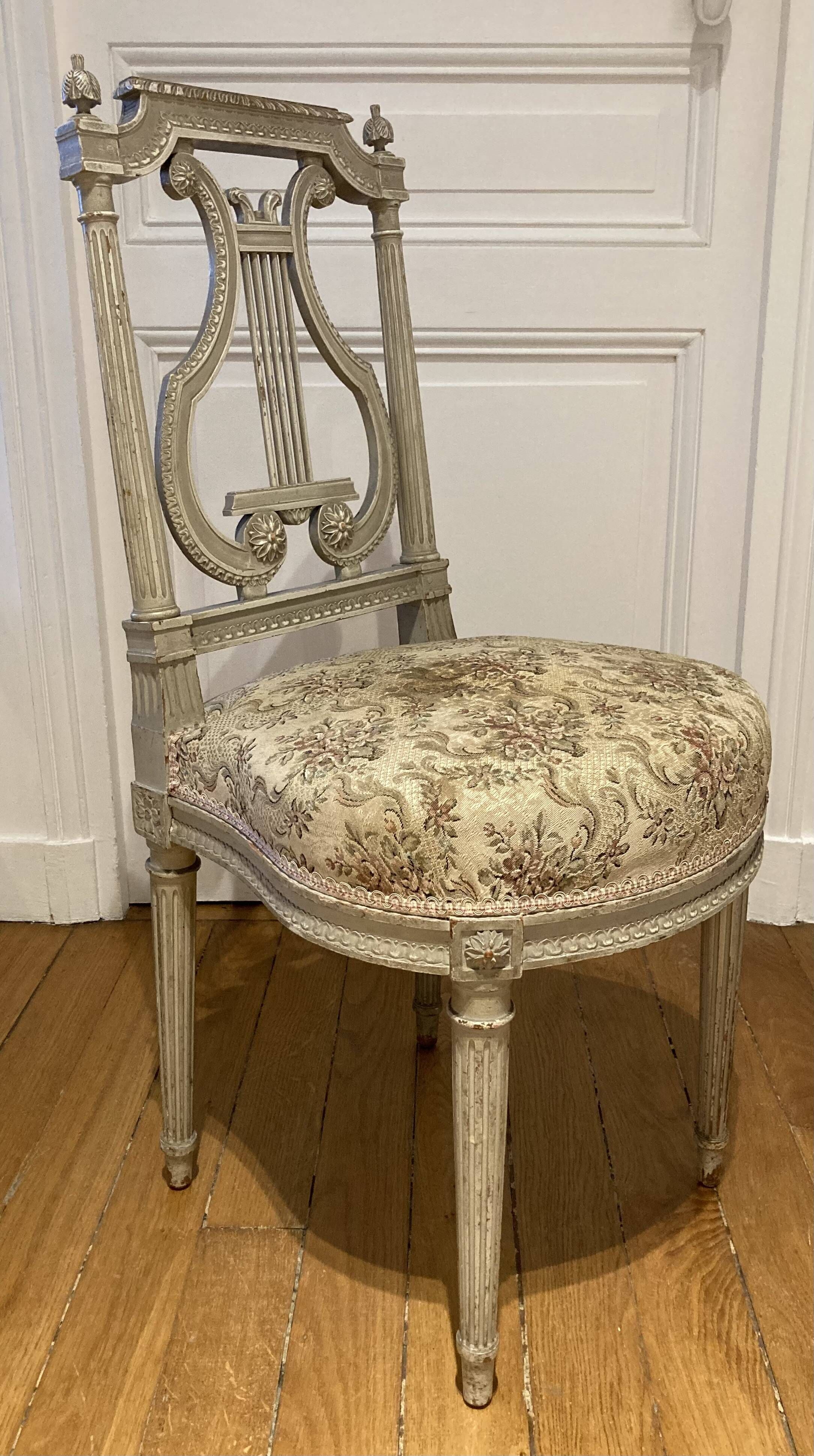 Pair of chairs, lyre back, based on a model by Jacob, Louis XVI style.