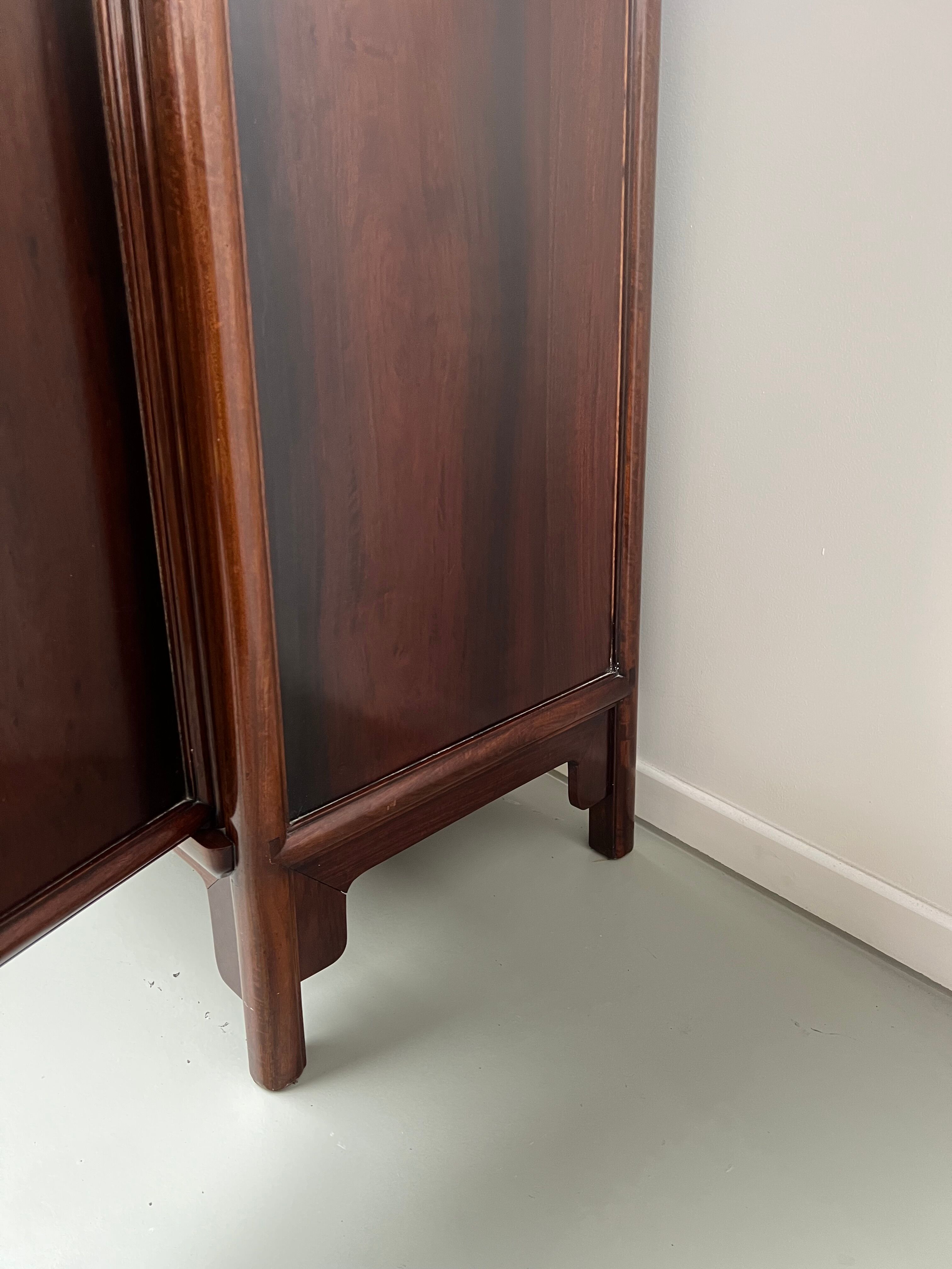 Chinese trapezoidal roller cabinet, made of rosewood.