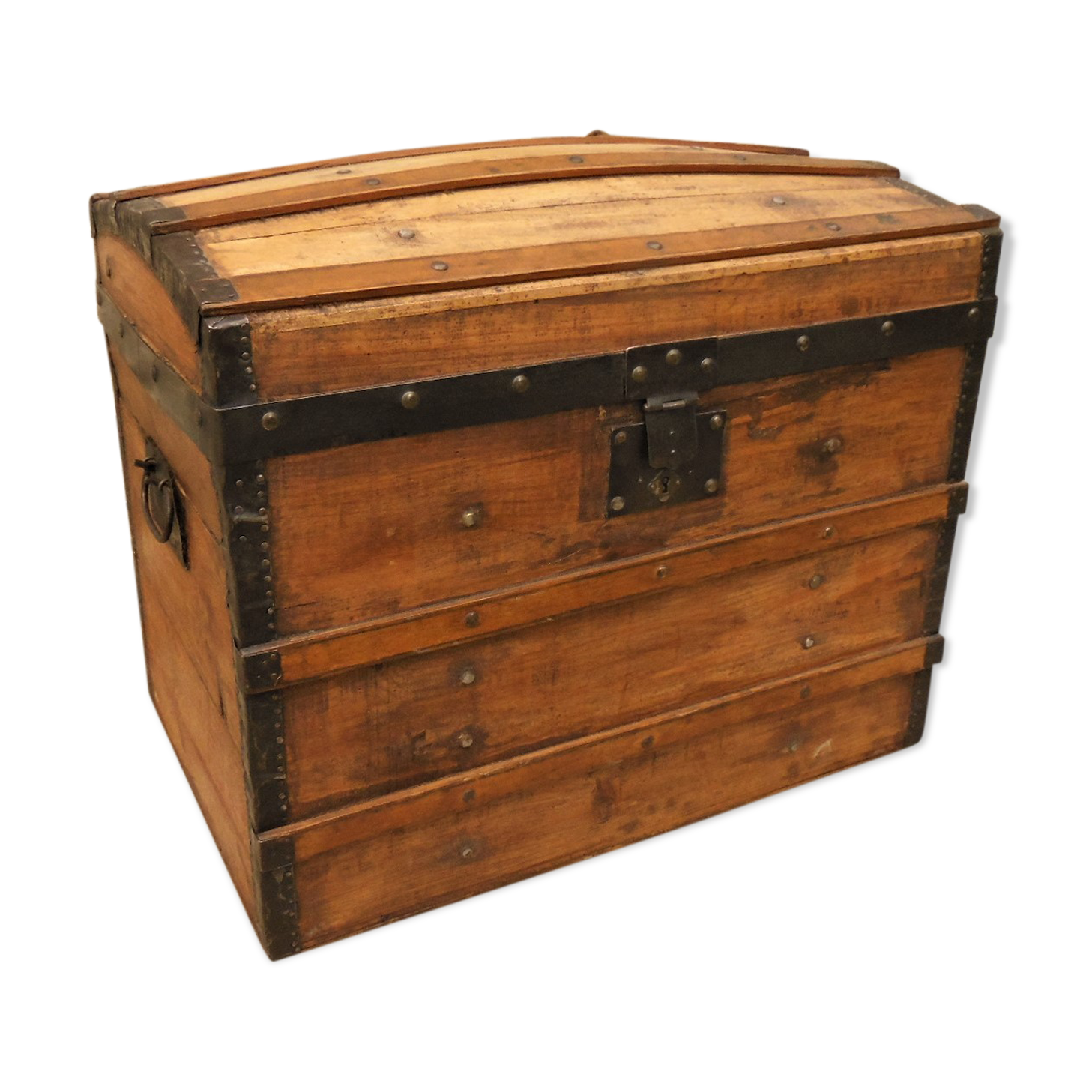Ancient travel trunk, bulging wooden chest