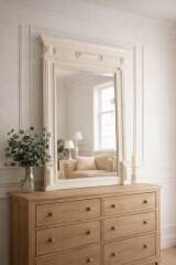 Miroir ancien biseauté, cadre en bois et stuc patiné gris perle.
