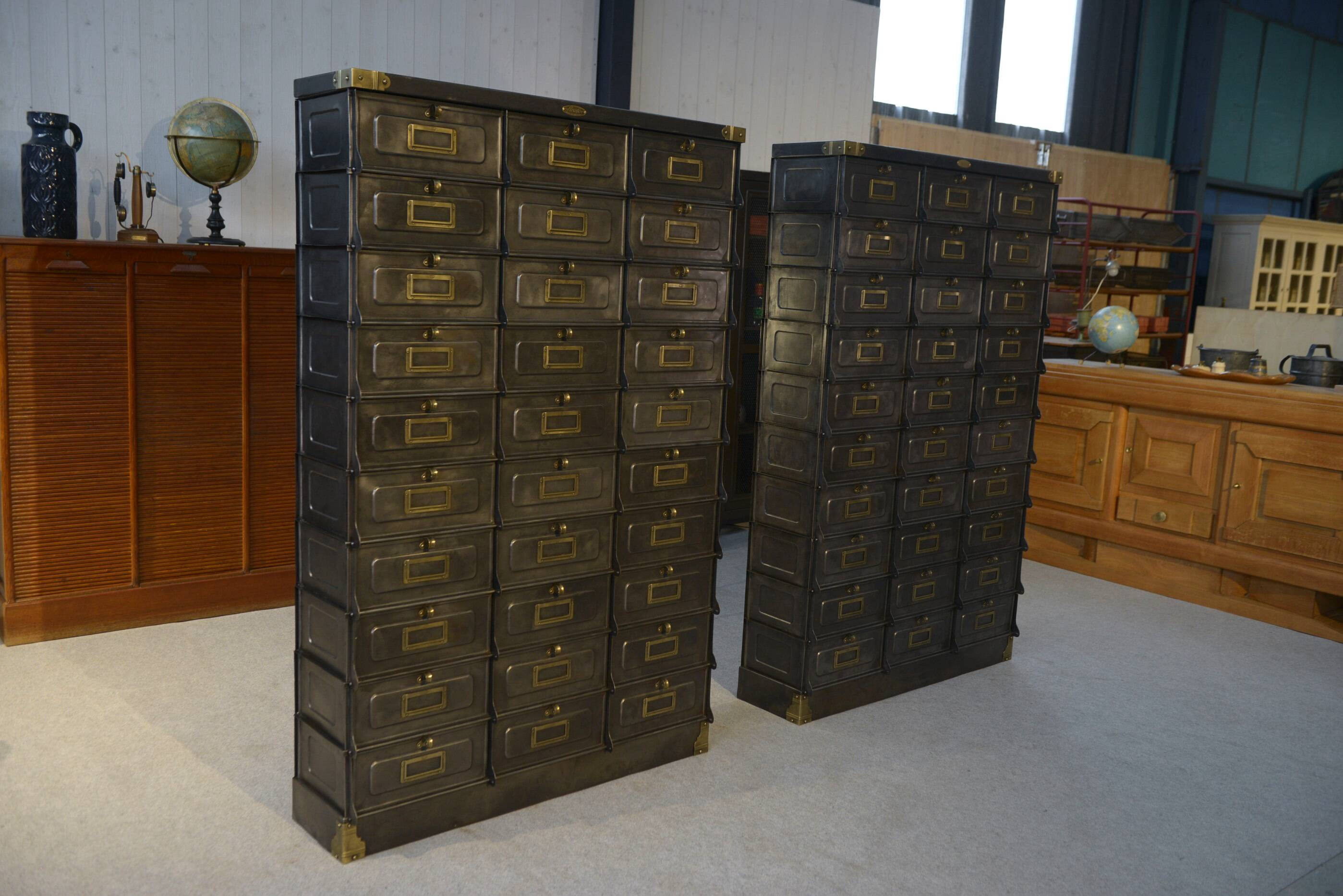 Pair of STRAFOR French cabinets with flaps, circa 1920s