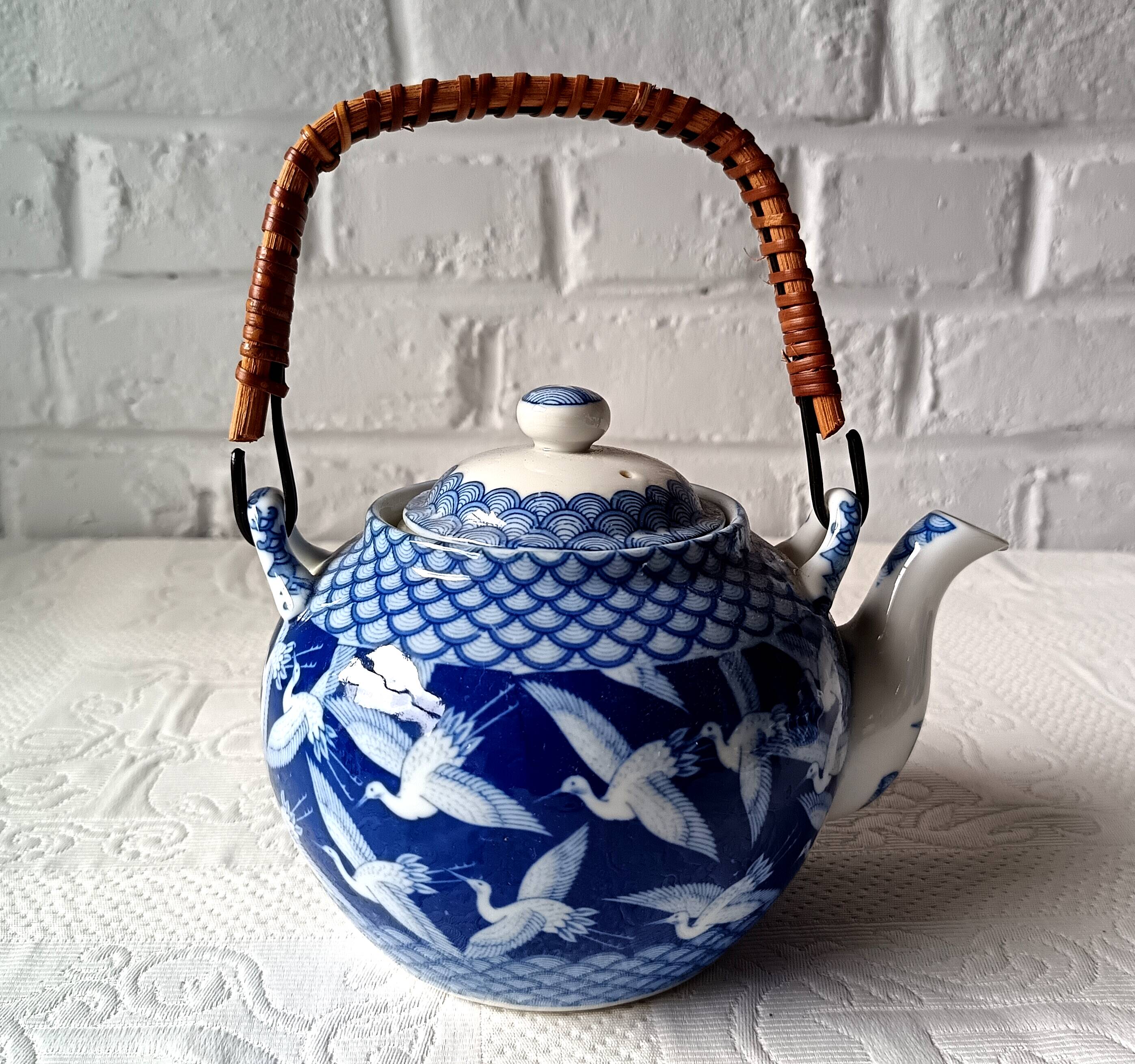Japanese tea set in fine porcelain with crane motif