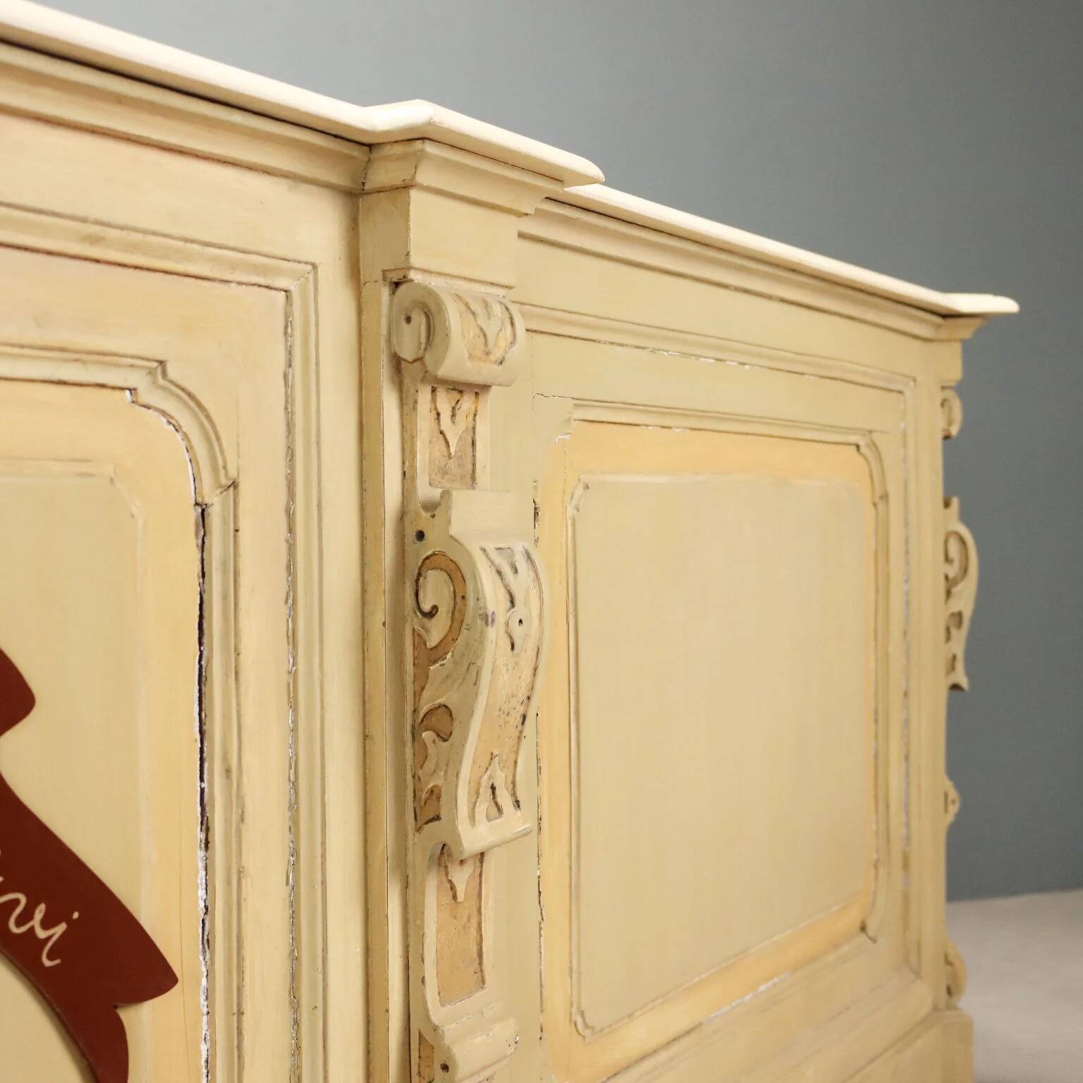 Antique pharmacy counter in lacquered walnut, Italy, late 19th century.