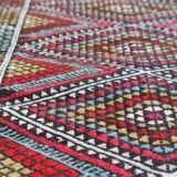Handmade multicolored diamond patterned kilim rug in natural wool