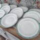 Set of 12 Longwy France earthenware soup plates, Trianon model