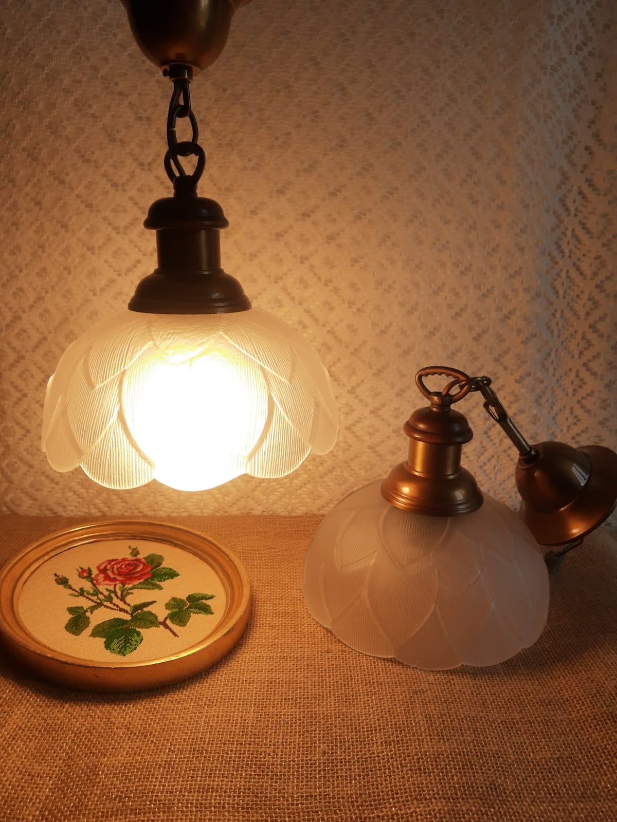 Pair of frosted glass flower pendant lights with vintage wood and brass