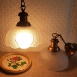 Pair of frosted glass flower pendant lights with vintage wood and brass