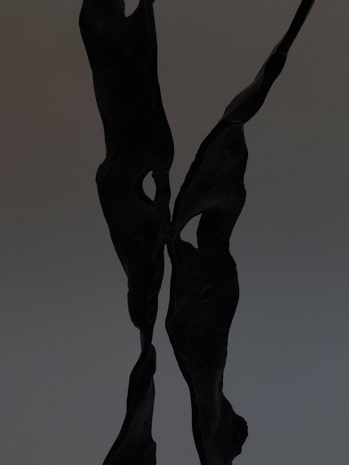 Sculptural brutalist floor candle holder made of hand-forged iron from the 1950s.