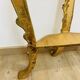 Golden console in Louis XV Rococo style made of resin.