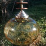Vintage suspension ball in amber glass