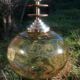 Vintage suspension ball in amber glass