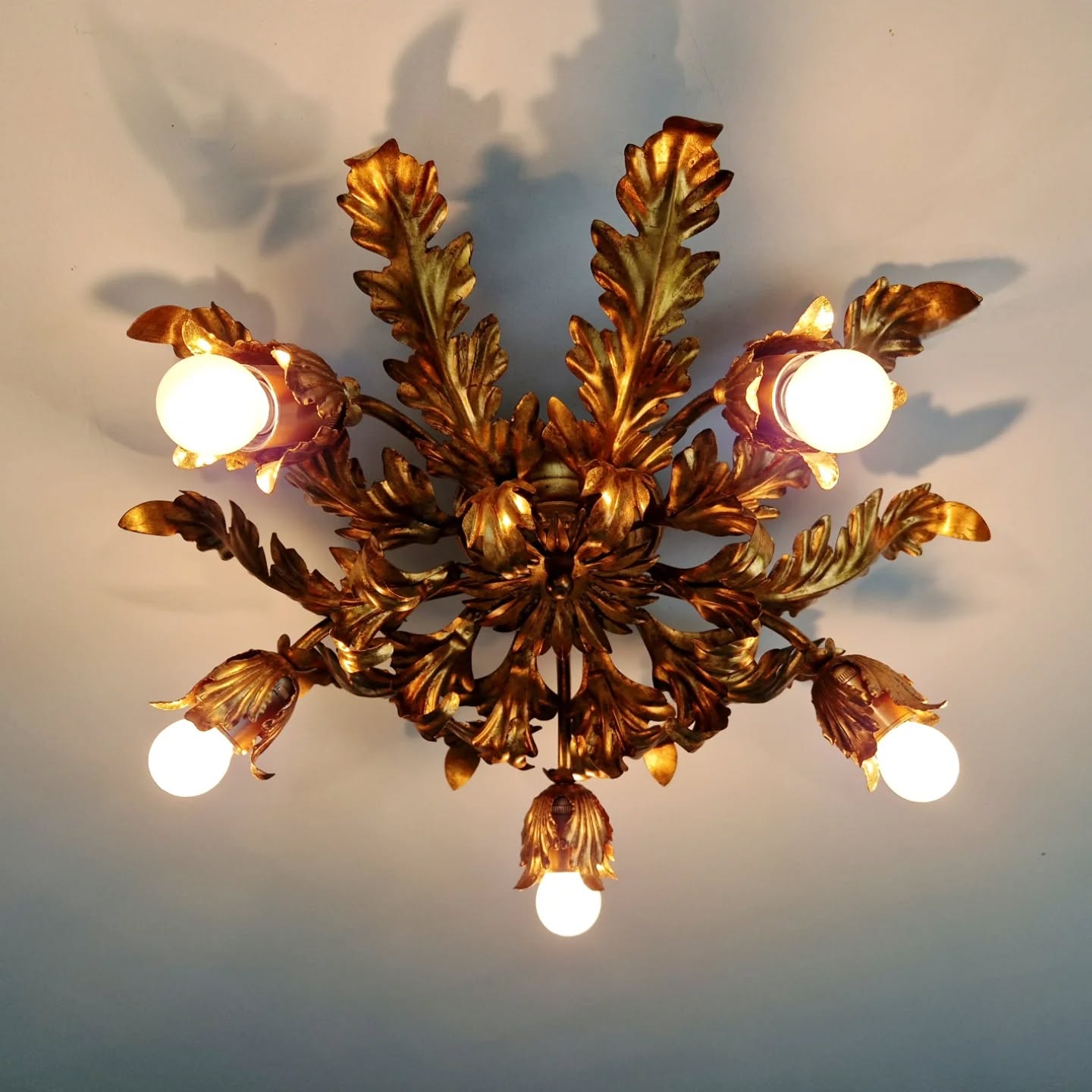 Italian floral ceiling light in gilded metal, 1970s.