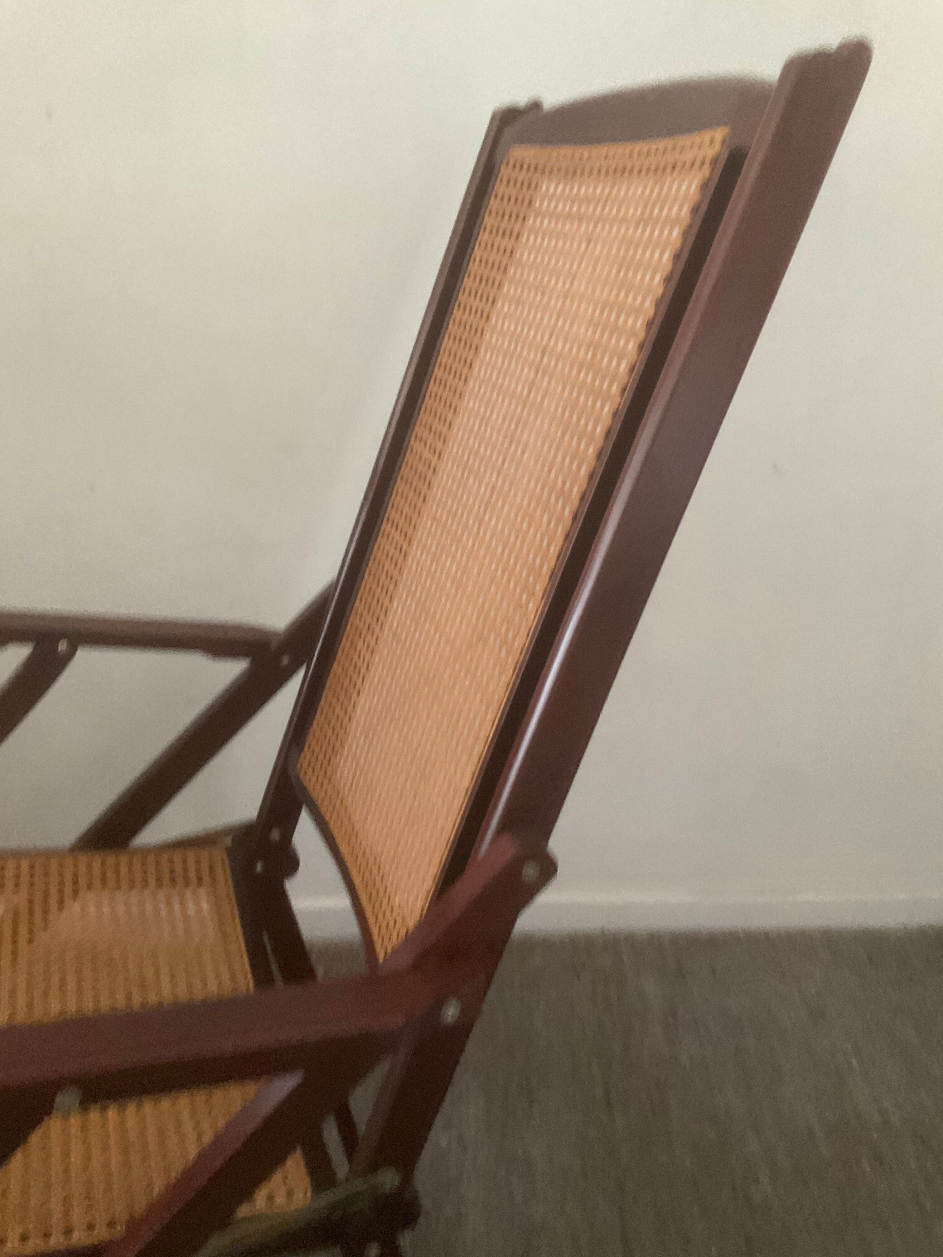 Folding wooden rocking chair and cannage from the 70s