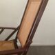 Folding wooden rocking chair and cannage from the 70s