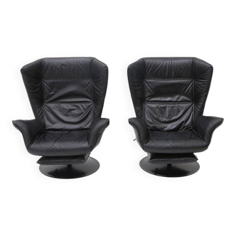 Set of black leather reclining chairs, 1970s.