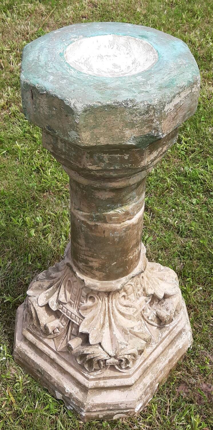 Holy water font on stone column (17th century)