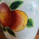 White Ceramic Vase with Peach and Leaf Motifs