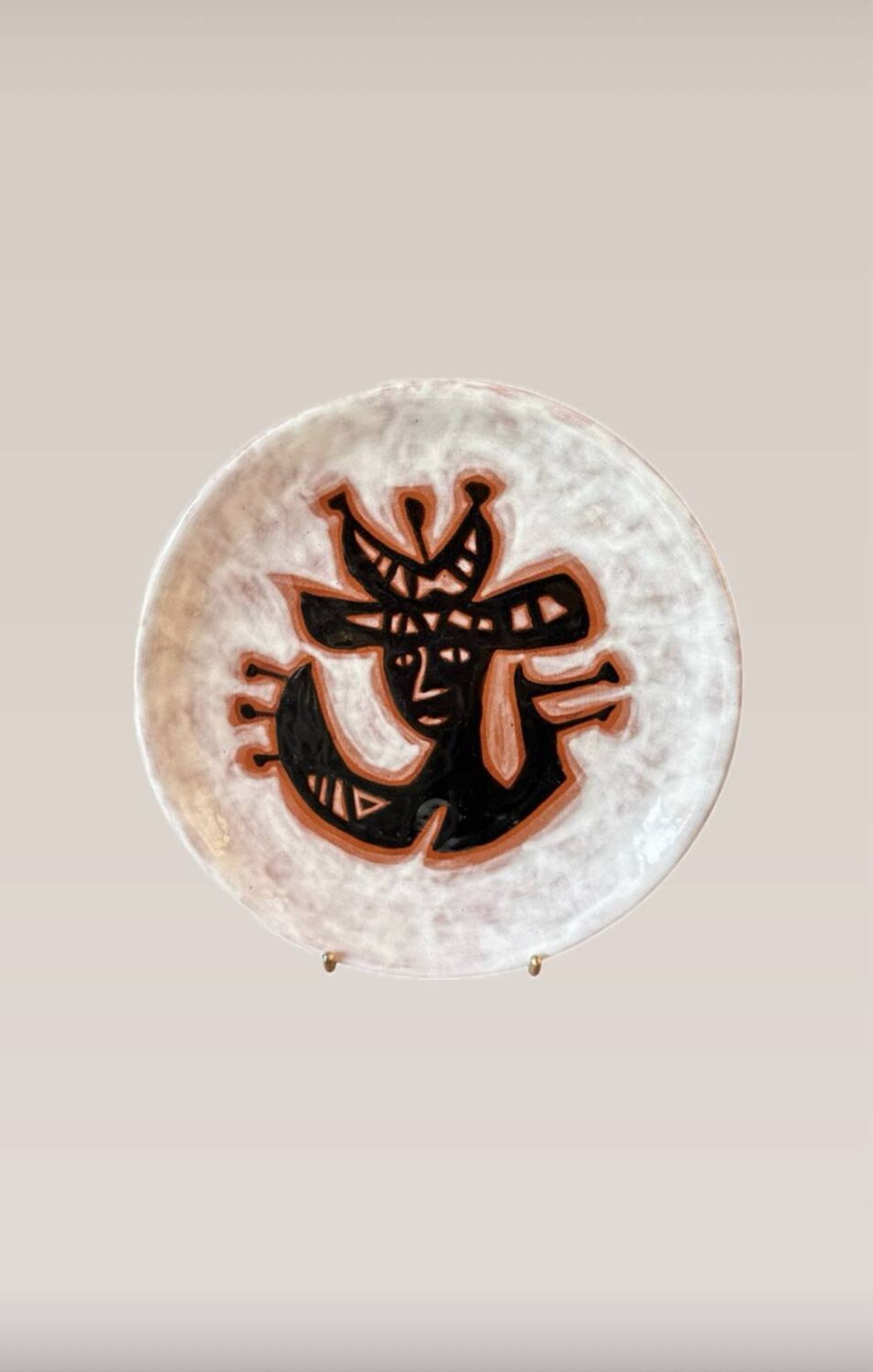 Terracotta plate, Jean Lurçat decorated with a rooster and foliage.