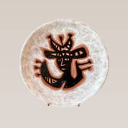 Terracotta plate, Jean Lurçat decorated with a rooster and foliage.