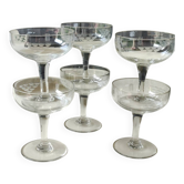 Set of 6 Baccarat-style champagne glasses. Stylized grape cluster decoration.