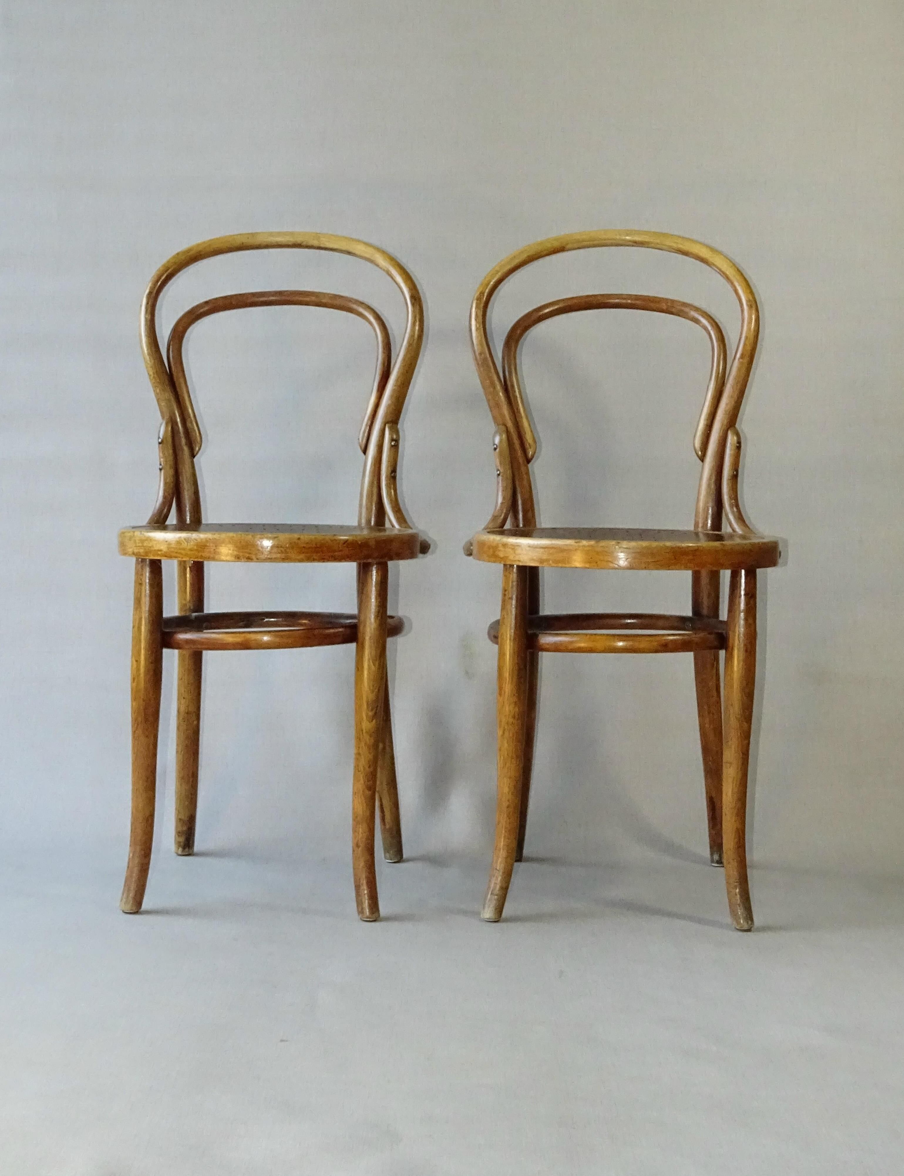 2 chairs n°14 - 1/2 by Kohn 1905, perforated wooden seats