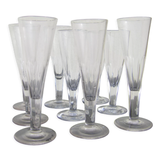 Series of nine antique flutes in blown glass