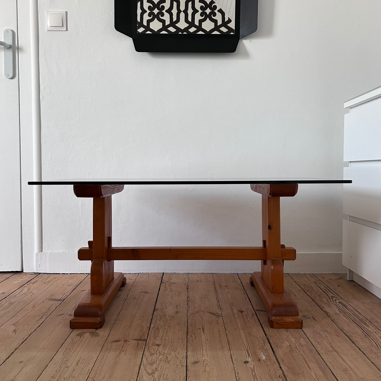 Pine coffee table with smoked glass top.