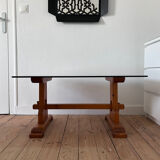 Pine coffee table with smoked glass top.