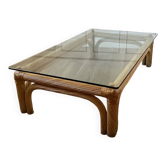 Large rattan and glass coffee table