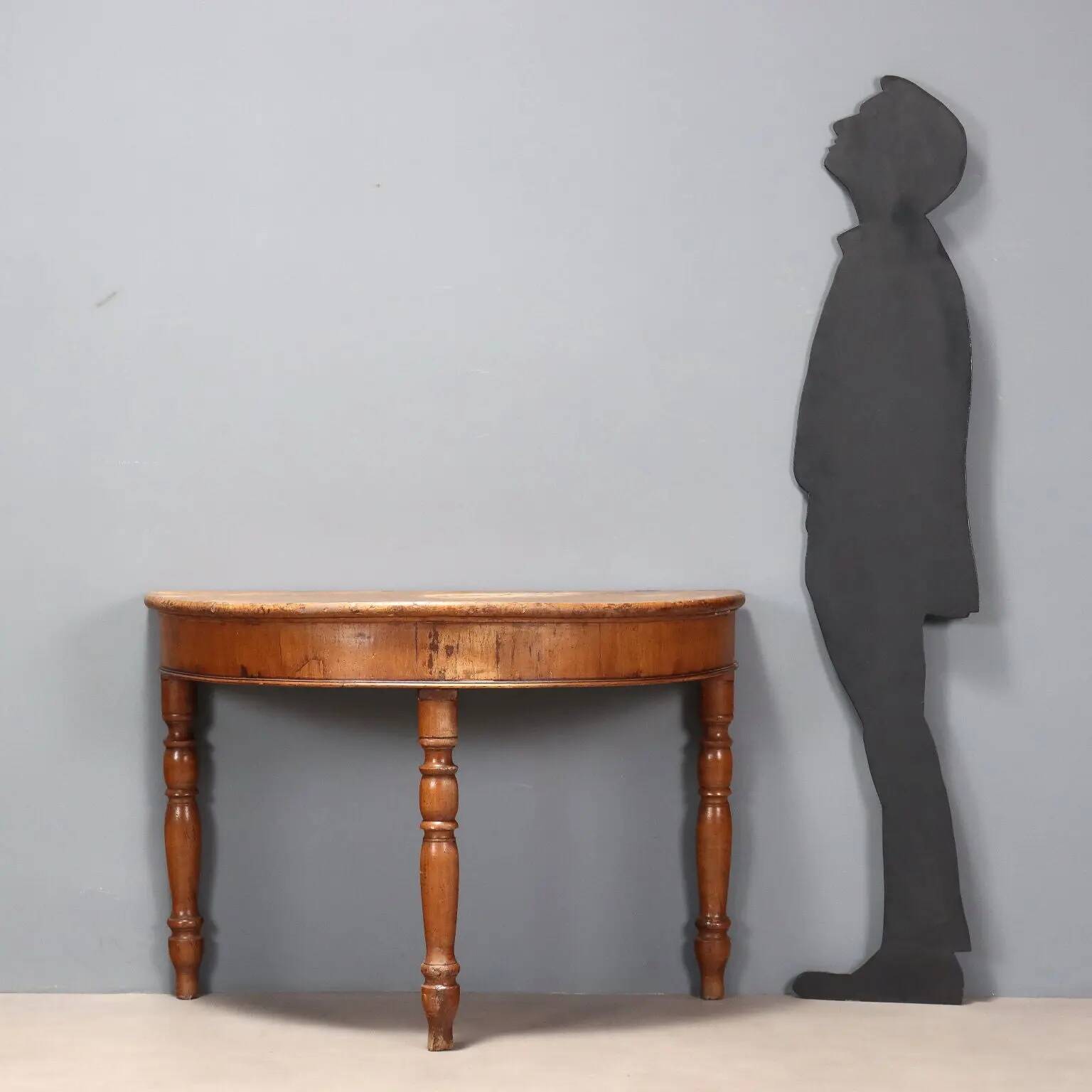 Antique walnut console with a half-moon top, Italy, 19th century.