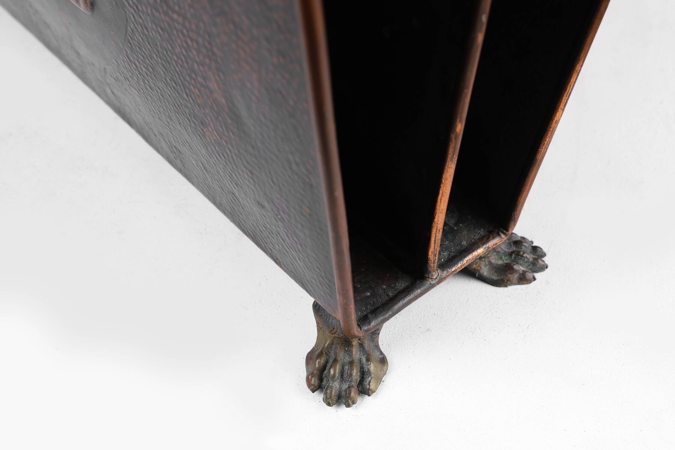 Mid-century magazine rack in hammered copper, France ca. 1900
