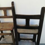 Pair of ethnic crude wooden chairs