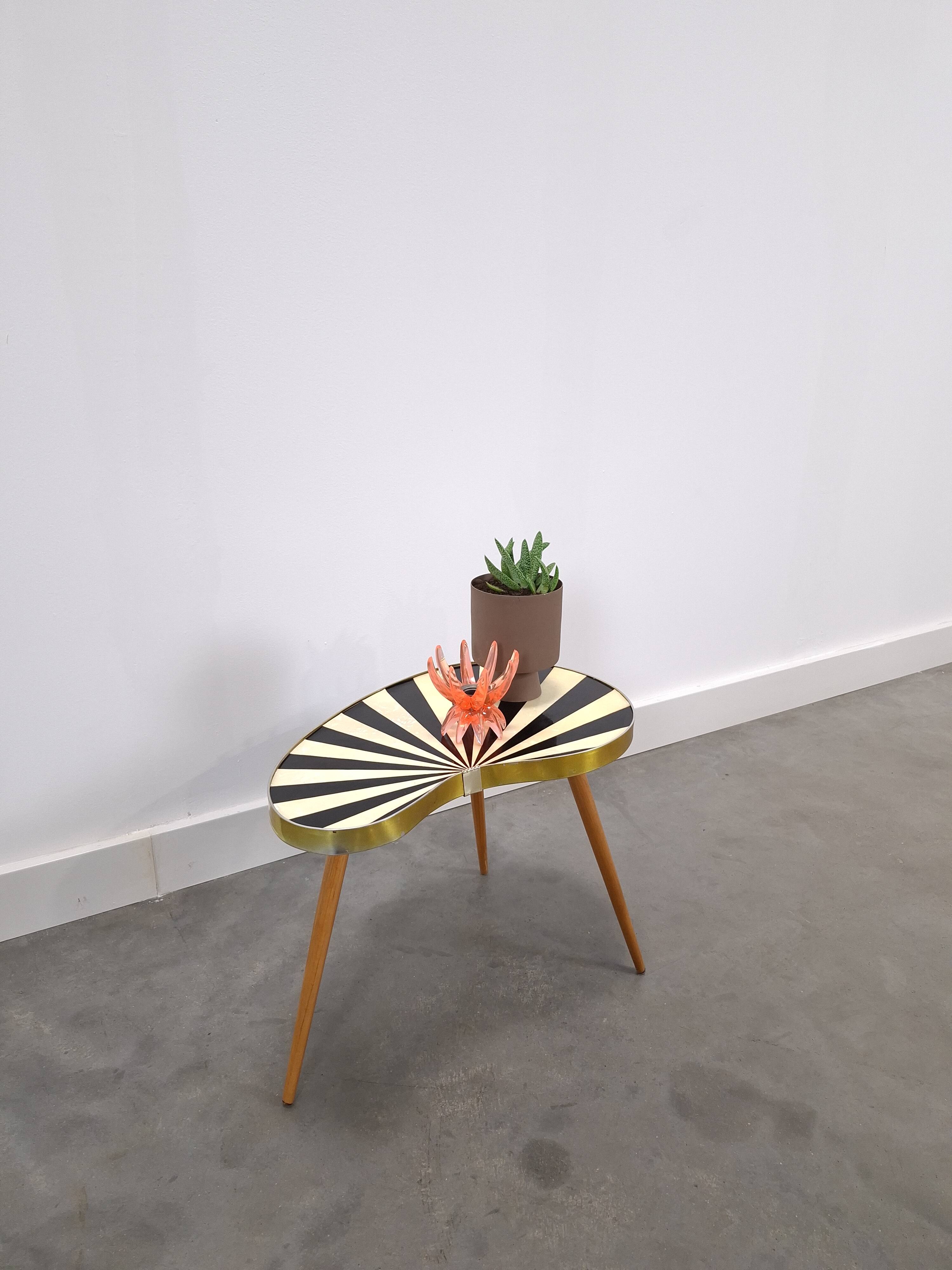 1950s kidney-shaped black and white table, plant table.