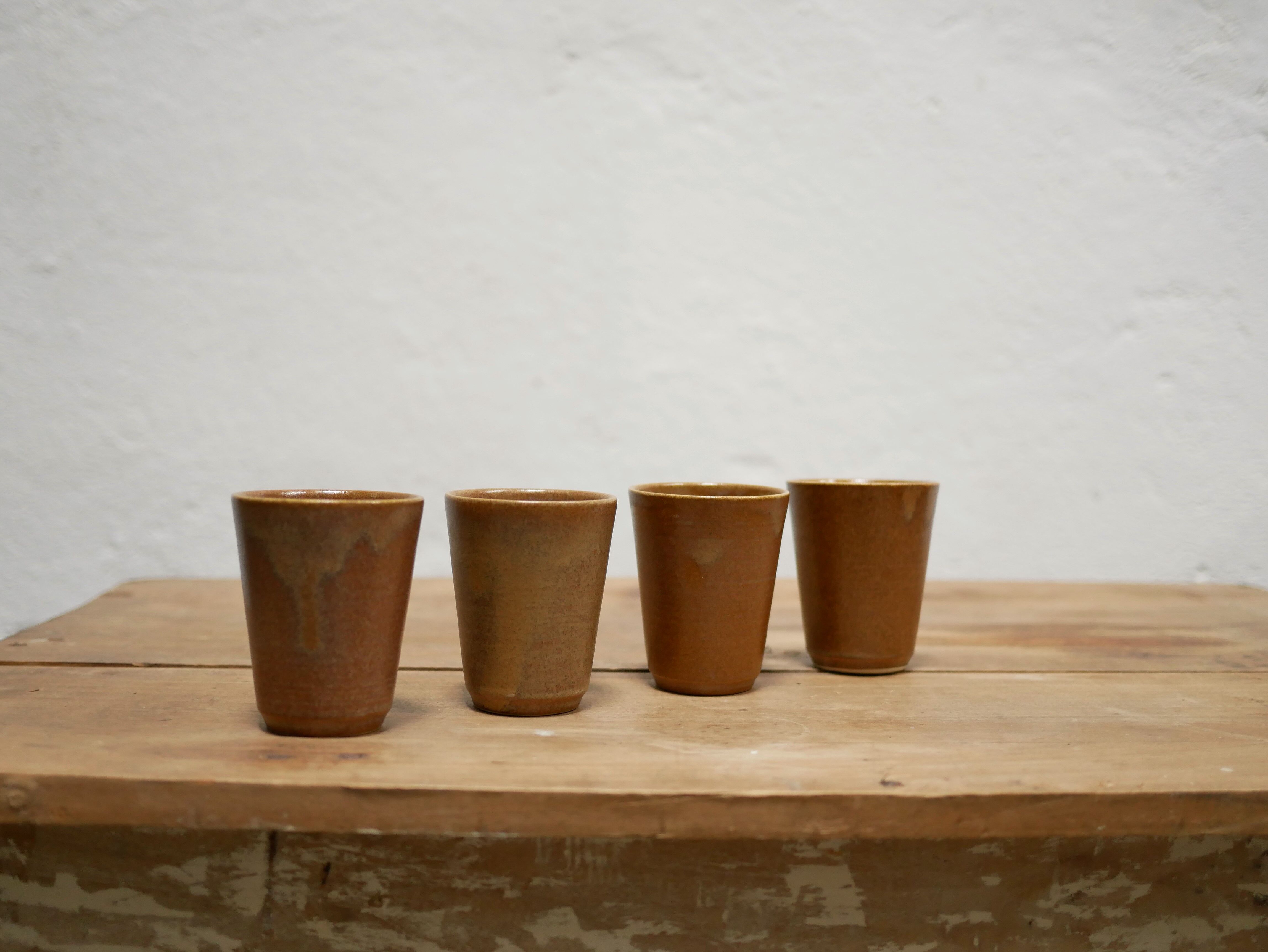 Series of 4 vintage stoneware glasses by the manufacture of Digoin, France