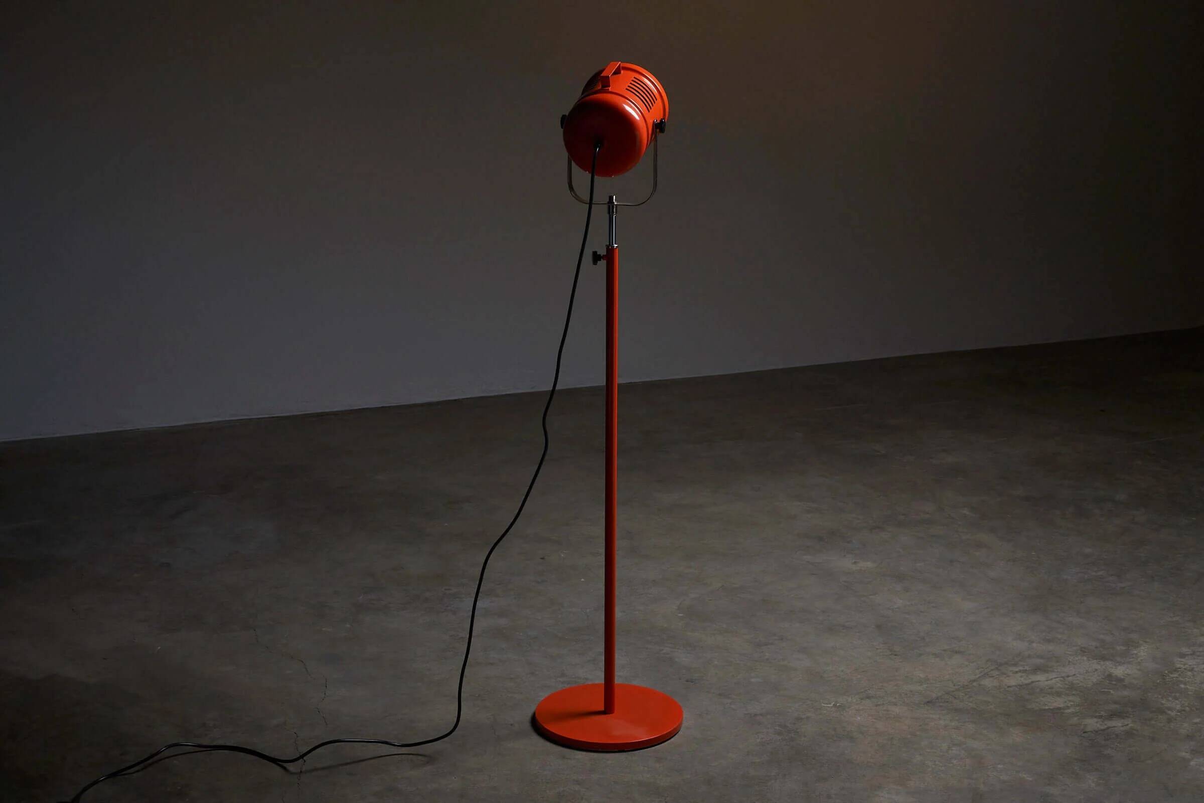 Bright orange spot floor lamp by Aneta