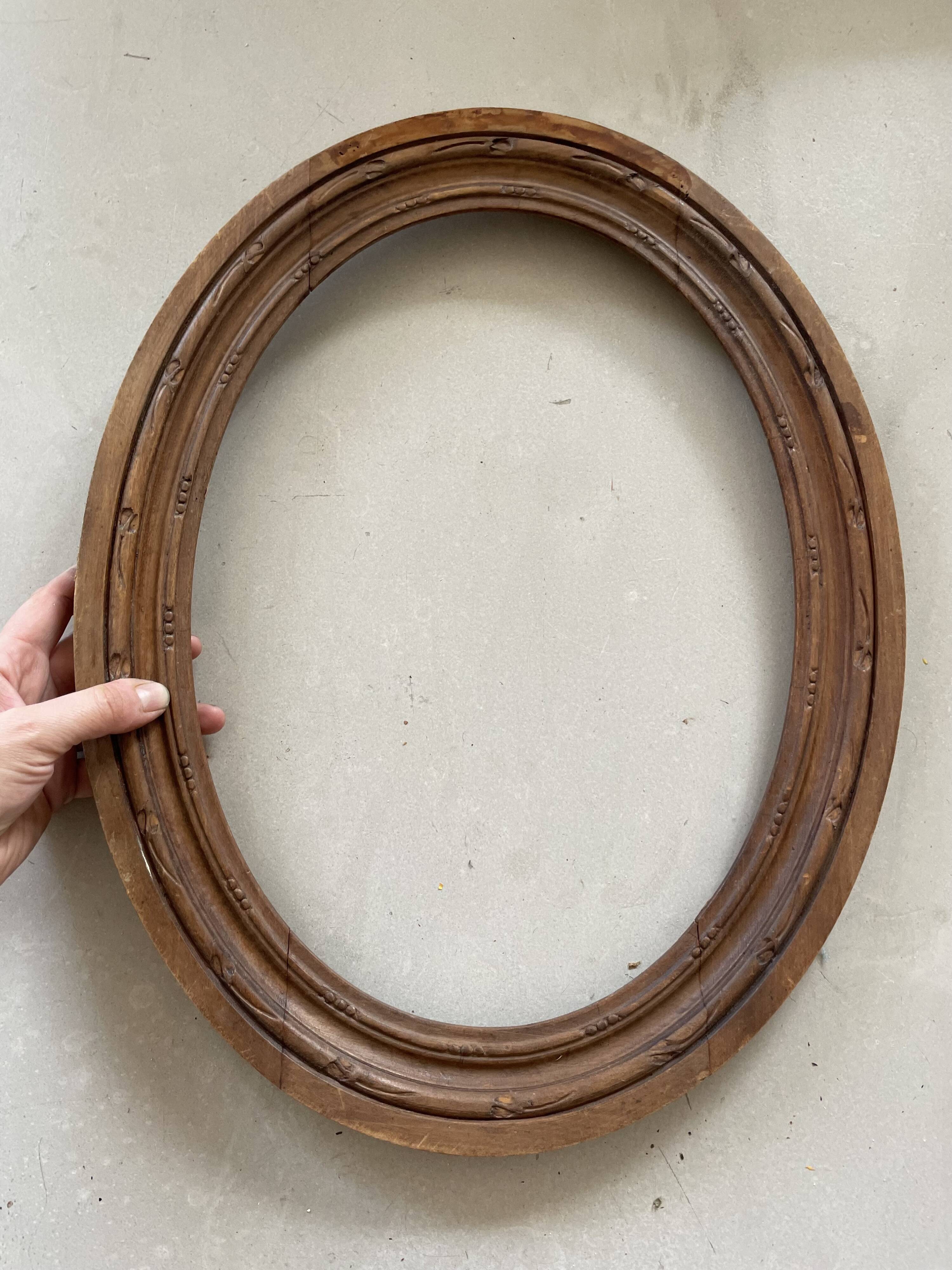 Oval old wooden frame