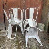 Set of 4 Tolix-style metal chairs