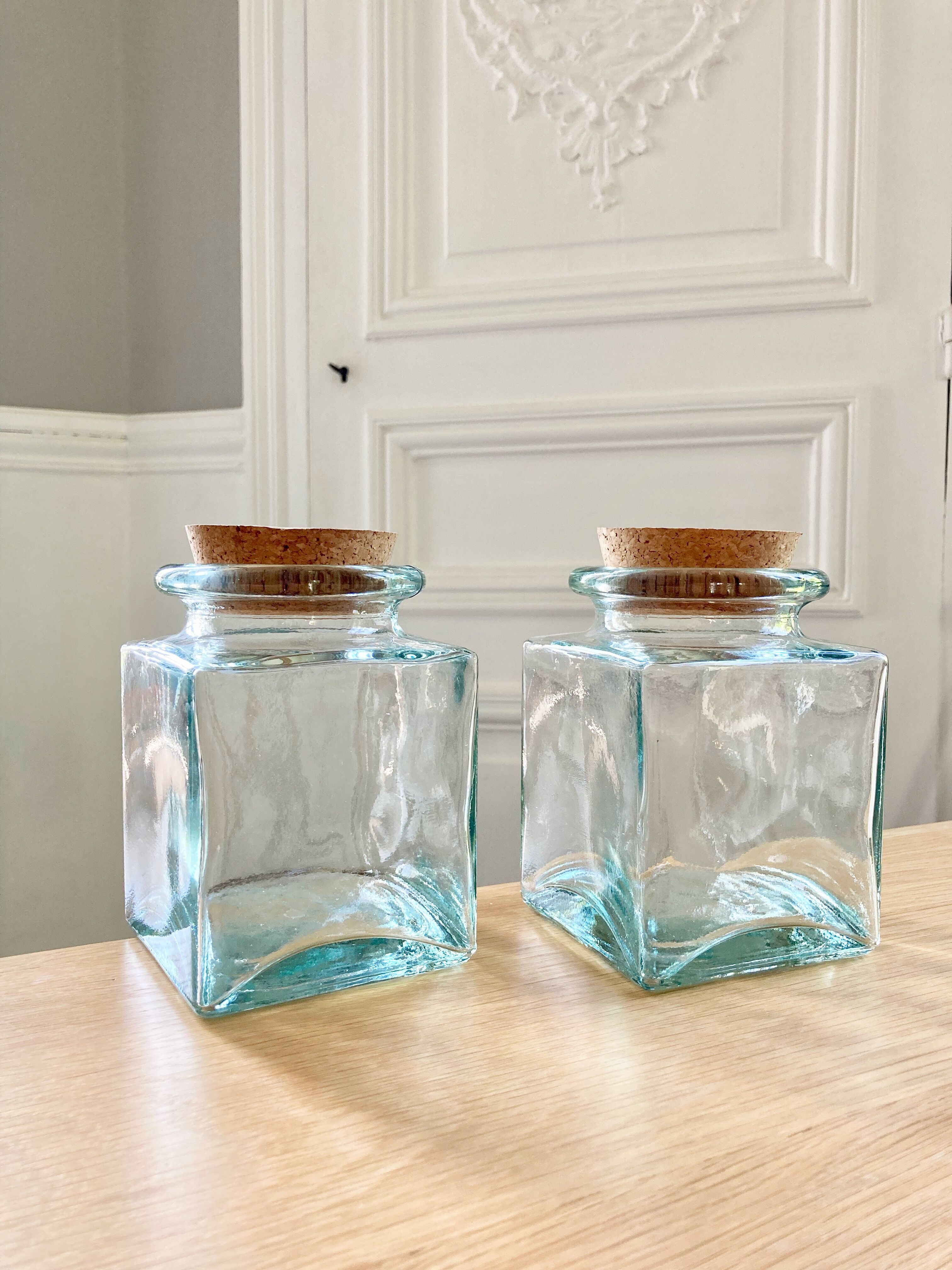 Pair of square jars in tinted glass and corks